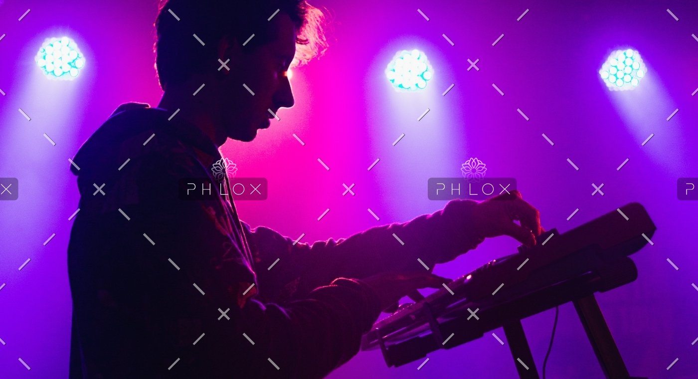 demo-attachment-30-man-holding-dj-mixer-machine-2350325