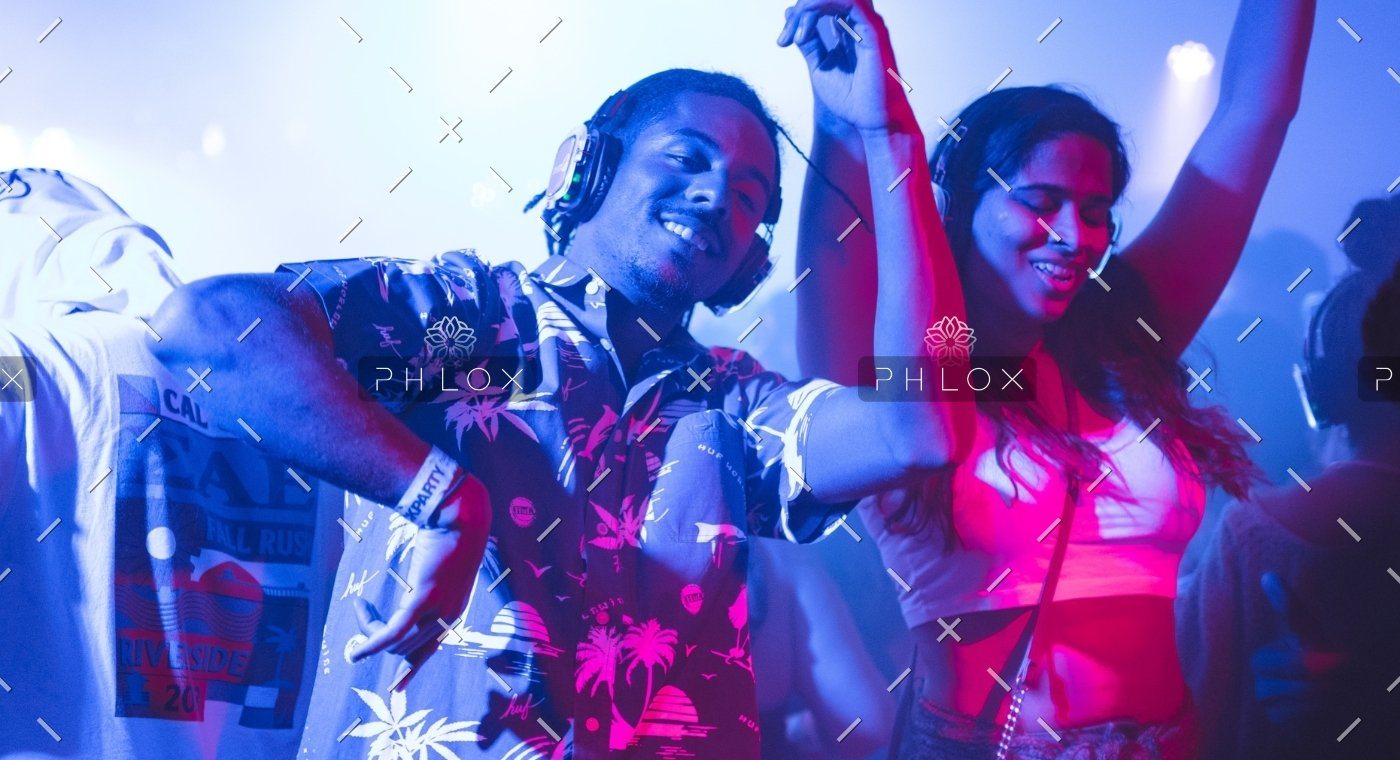 demo-attachment-34-smiling-man-standing-and-dancing-near-smiling-woman-2240771